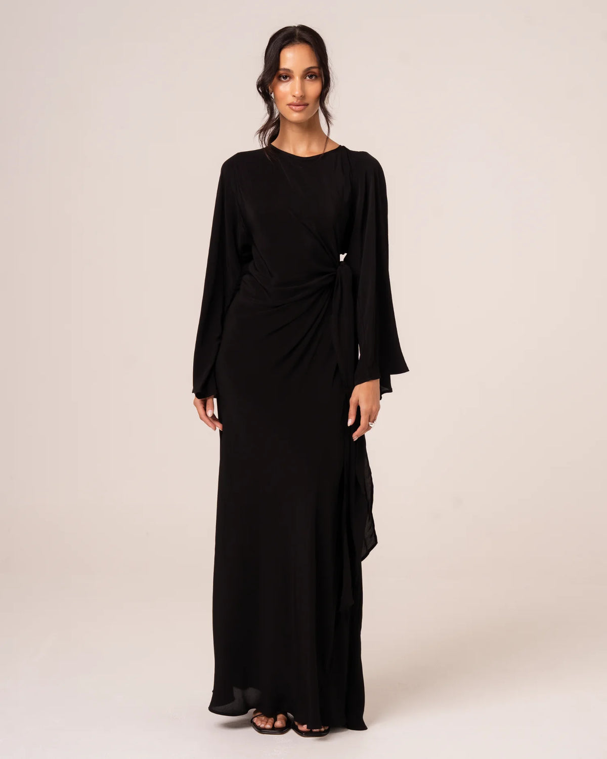 OchreLane Vela Batwing Maxi Dress in Noir