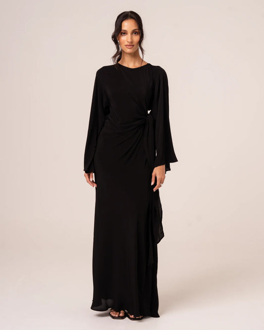 OchreLane Vela Batwing Maxi Dress in Noir